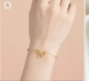 Gold Bow Charm Bracelet