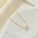 Elegant Gold Necklace with Solitaire Pendant